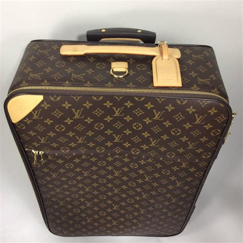 louis vuitton rolling luggage.